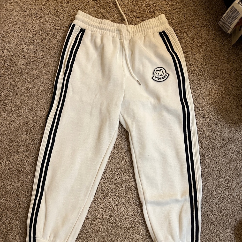 Super comfy and thick white sweatpants with strip sided